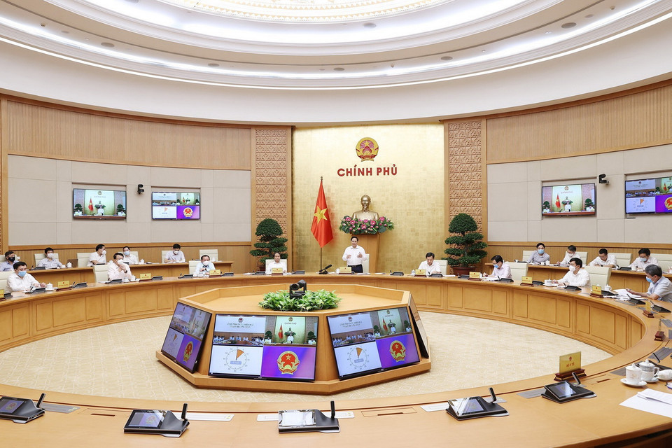  Quang cảnh buổi làm việc tại điểm cầu Chính phủ. (Ảnh: Dương Giang/TTXVN)