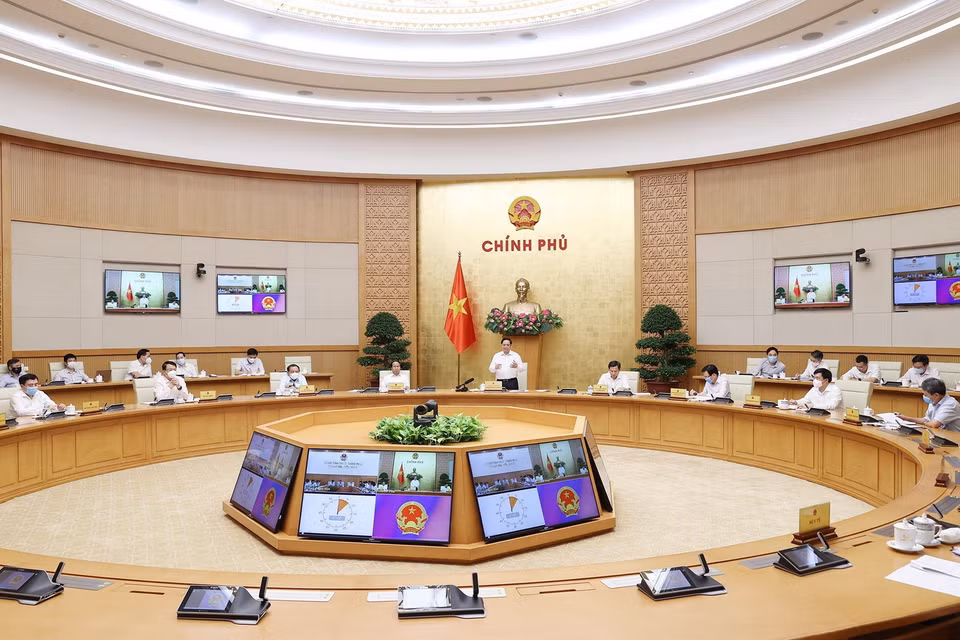  Quang cảnh buổi làm việc tại điểm cầu Chính phủ. (Ảnh: Dương Giang/TTXVN)