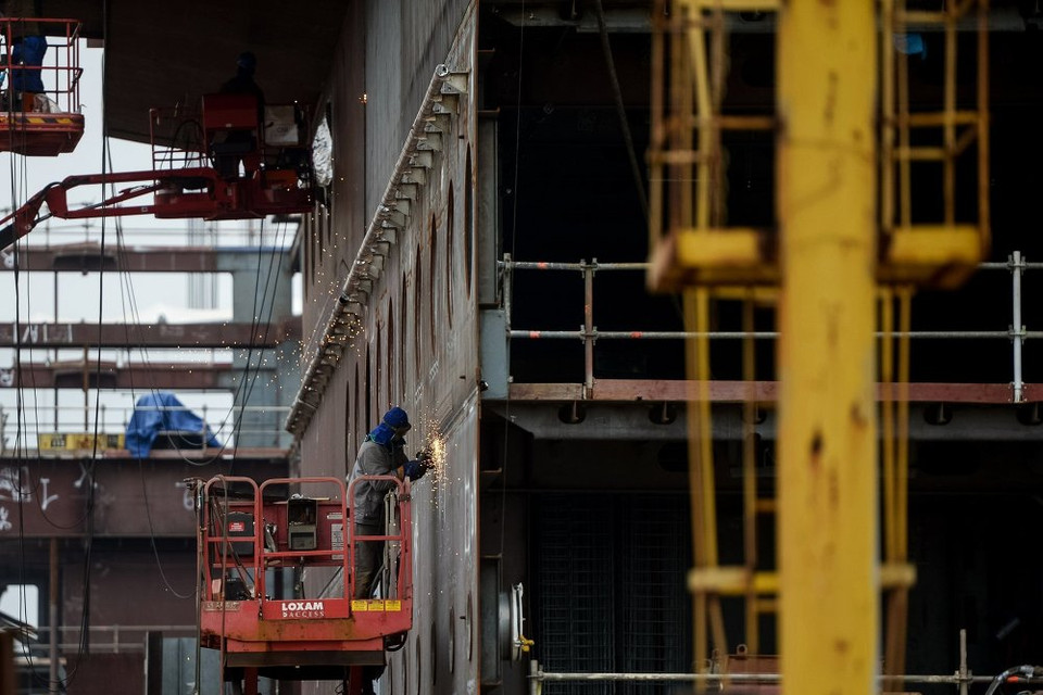 Công nhân đang làm việc. (Nguồn: sputniknews)