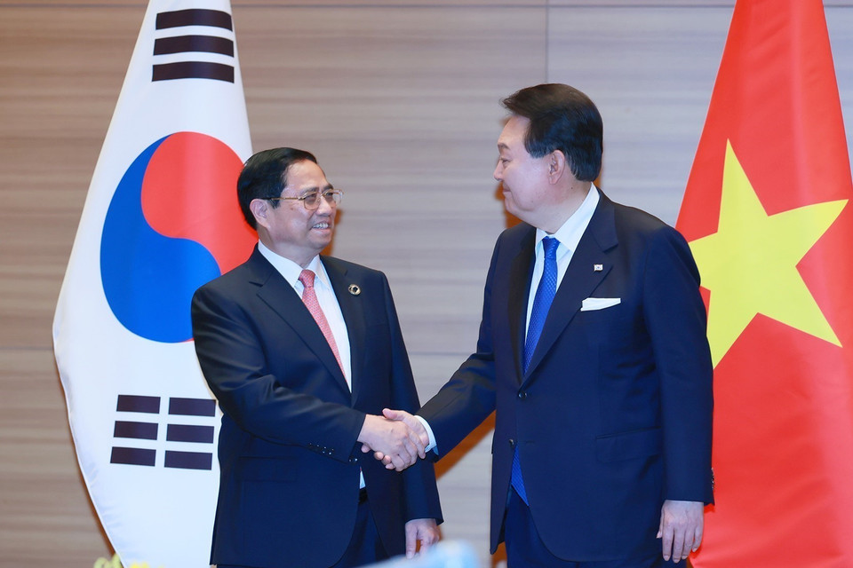 Thủ tướng Phạm Minh Chính và Tổng thống Hàn Quốc Yoon Suk-yeol. (Ảnh: Dương Giang/TTXVN)