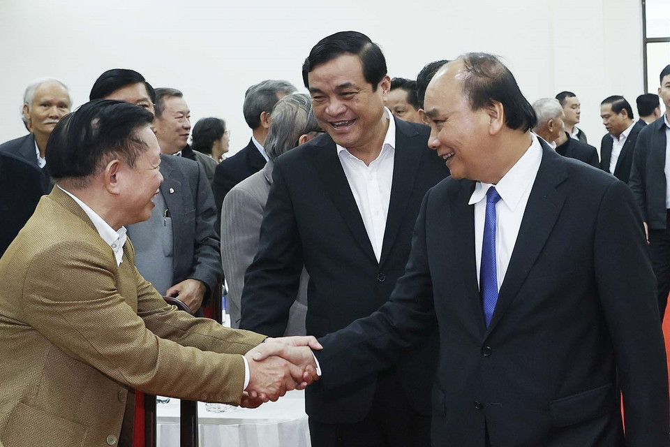 Chủ tịch nước Nguyễn Xuân Phúc và các đại biểu. (Ảnh: Thống Nhất/TTXVN)