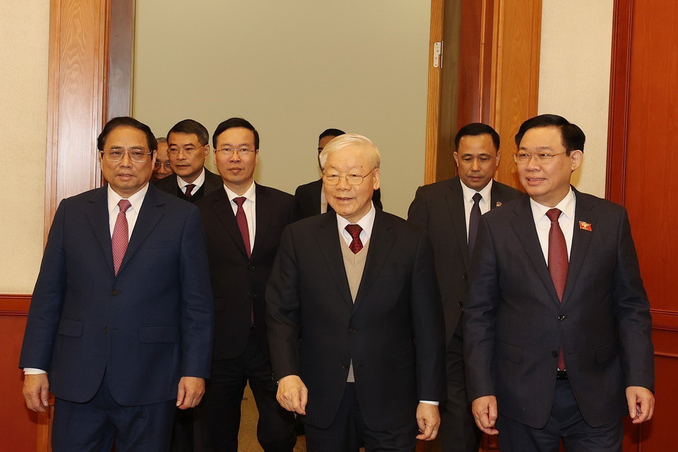 Tổng Bí thư Nguyễn Phú Trọng cùng các lãnh đạo Đảng, Nhà nước dự chúc Tết. (Ảnh: Trí Dũng/TTXVN)