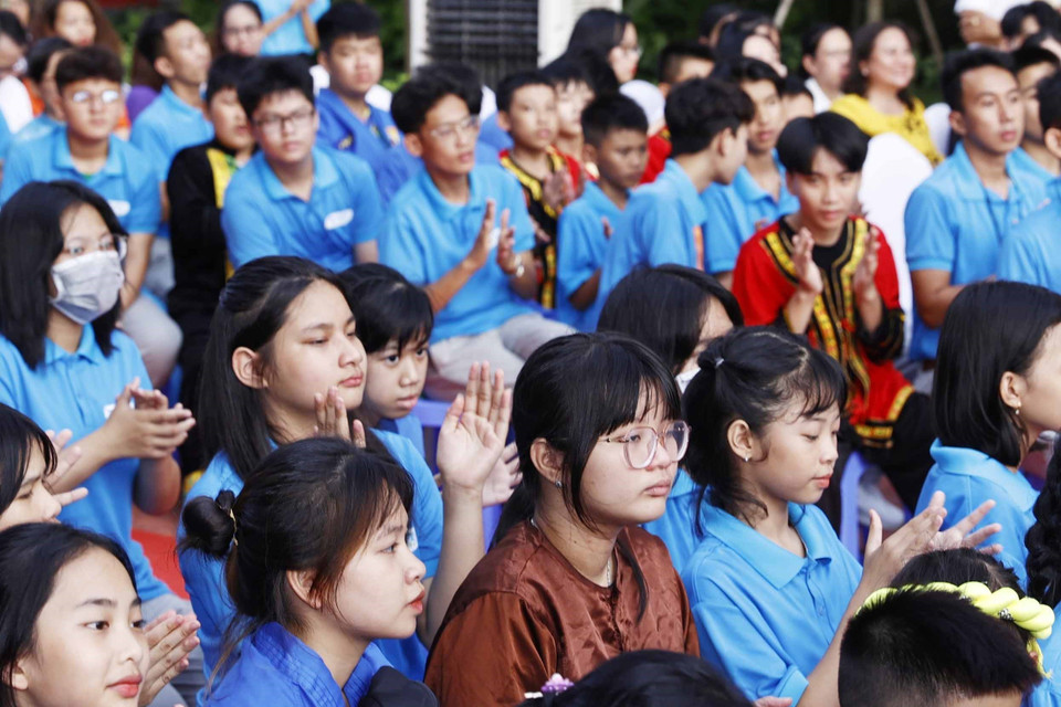 Học sinh trường tiểu học, THCS và THPT Hy Vọng tại Ngày hội tới trường. (Ảnh: Thống Nhất/TTXVN)