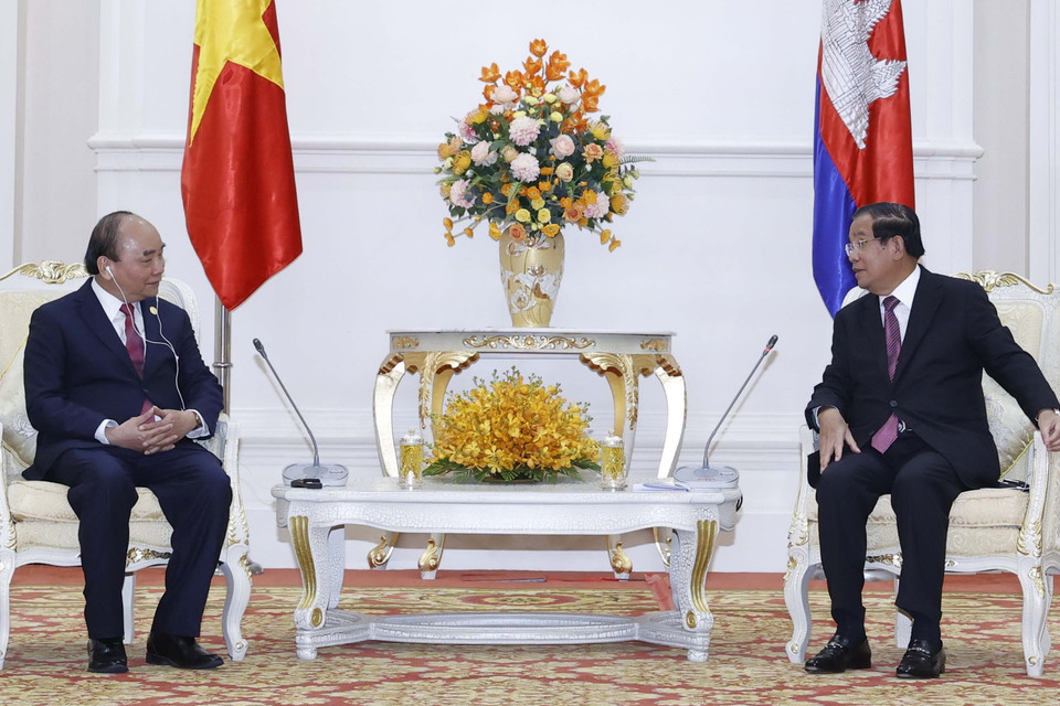 Chủ tịch nước Nguyễn Xuân Phúc gặp Thủ tướng Campuchia Samdech Techo Hun Sen. (Ảnh: Thống Nhất/TTXVN)