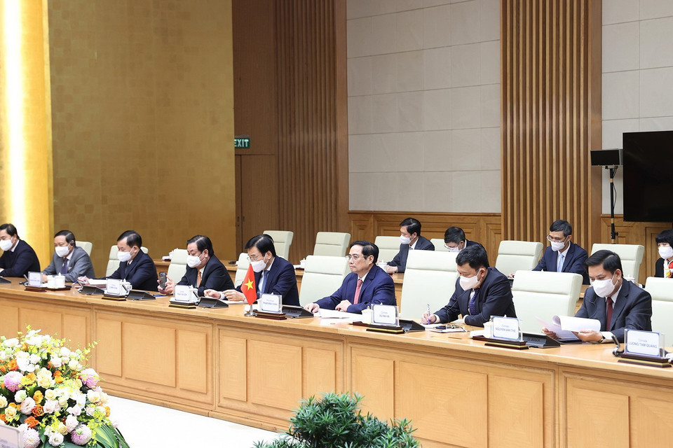 Thủ tướng Phạm Minh Chính và các thành viên đoàn Việt Nam tham dự buổi hội kiến. (Ảnh: Dương Giang/TTXVN)