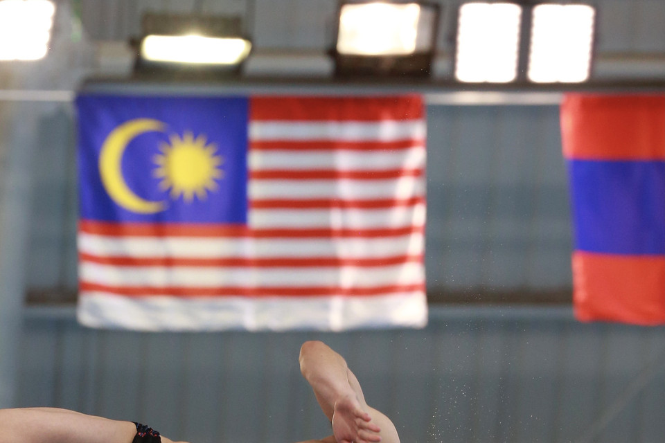 Phần thi đấu của vận động viên Việt Nam Nguyễn Tùng Dương nội dung Đơn nam cầu mềm 3m. (Ảnh: Trọng Đạt/TTXVN)