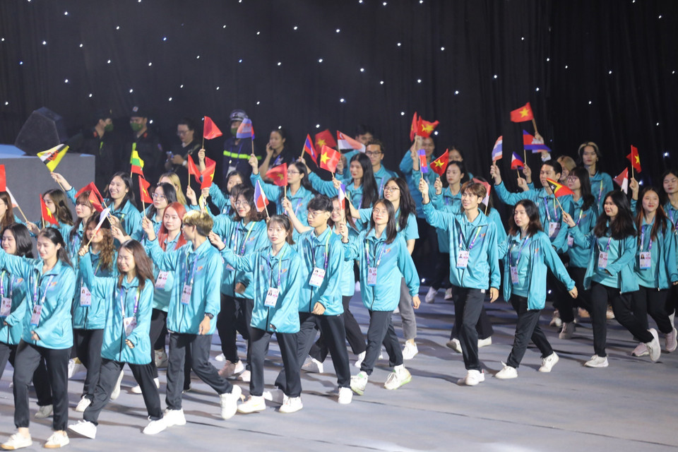 Màn diễu hành của các tình nguyện viên. (Ảnh: TTXVN)