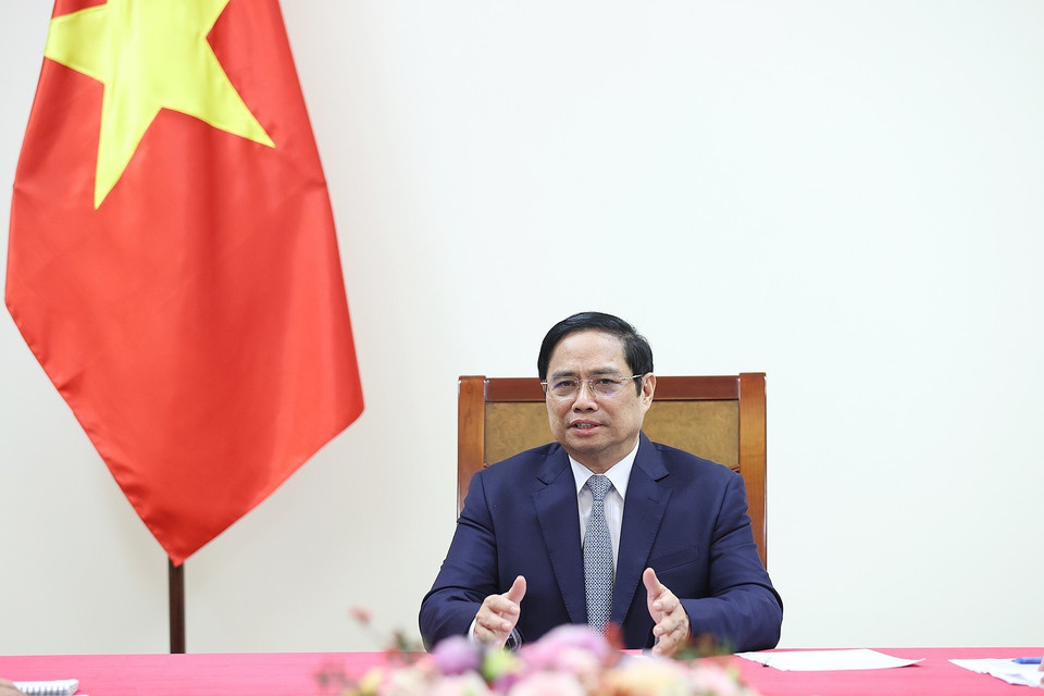 Thủ tướng Phạm Minh Chính điện đàm với ông John Kerry, đặc phái viên của Tổng thống Hoa Kỳ. (Ảnh: Dương Giang/TTXVN)