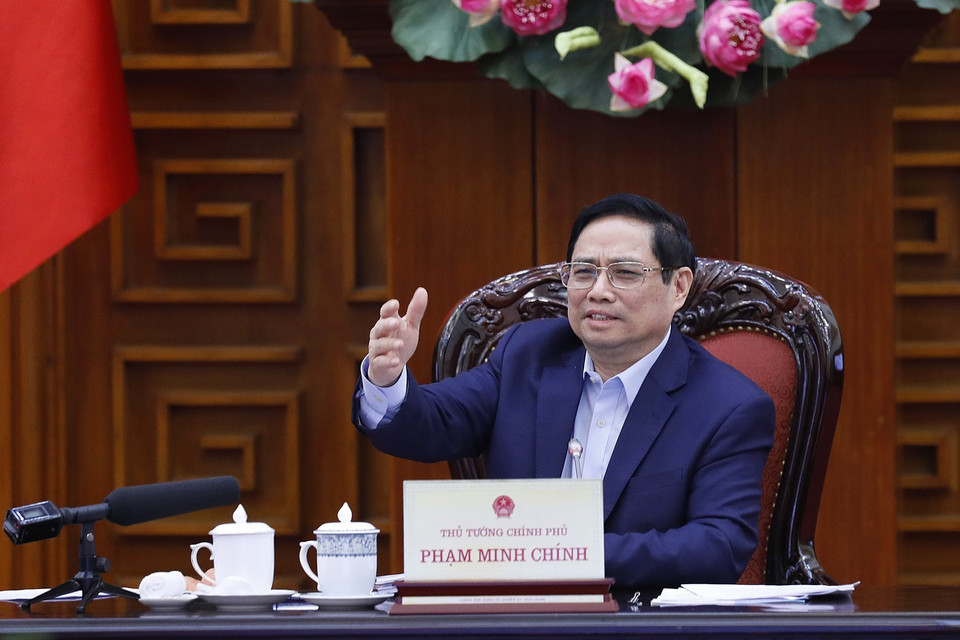 Sáng 27/11, tại Trụ sở Chính phủ, Thủ tướng Phạm Minh Chính, Trưởng Ban Chỉ đạo quốc gia phòng, chống dịch COVID-19 chủ trì cuộc họp với các bộ, ngành, chuyên gia y tế và các nhà khoa học về việc nhập khẩu, sản xuất vaccine, thuốc điều trị COVID-19. (Ảnh: Dương Giang/TTXVN)