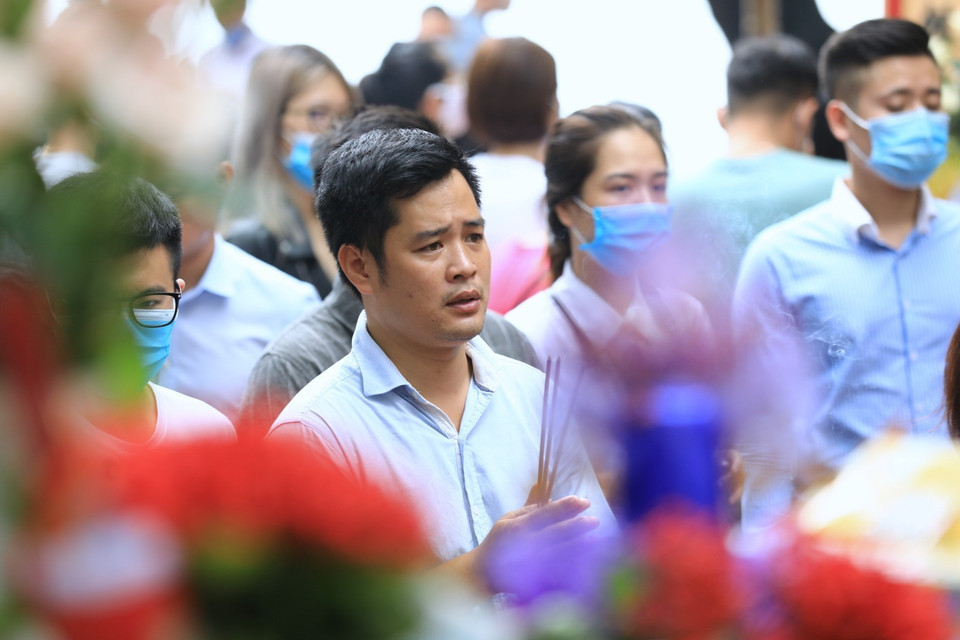 Trong tình hình dịch bệnh diễn ra phức tạp thì việc không đeo khẩu trang là hết sức nguy hiểm, nhất là ở những nơi đông người. (Ảnh: Thành Đạt/TTXVN)