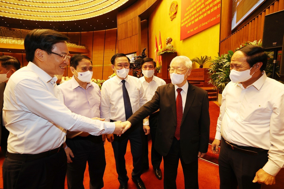 Tổng Bí thư Nguyễn Phú Trọng, Thủ tướng Phạm Minh Chính, Chủ tịch Quốc hội Vương Đình Huệ và các đại biểu dự hội nghị. (Ảnh: Trí Dũng/TTXVN)