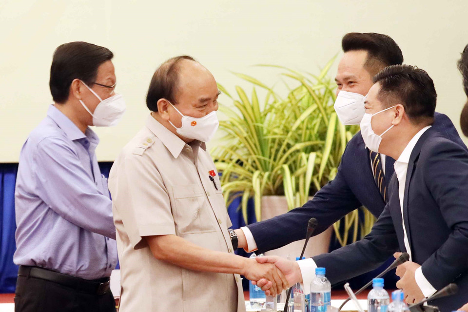 Sáng 12/10, tại Thành phố Hồ Chí Minh, Chủ tịch nước Nguyễn Xuân Phúc gặp mặt Hội Doanh nhân trẻ Việt Nam nhân kỷ niệm Ngày Doanh nhân Việt Nam 13/10. (Ảnh: Thống Nhất/TTXVN)