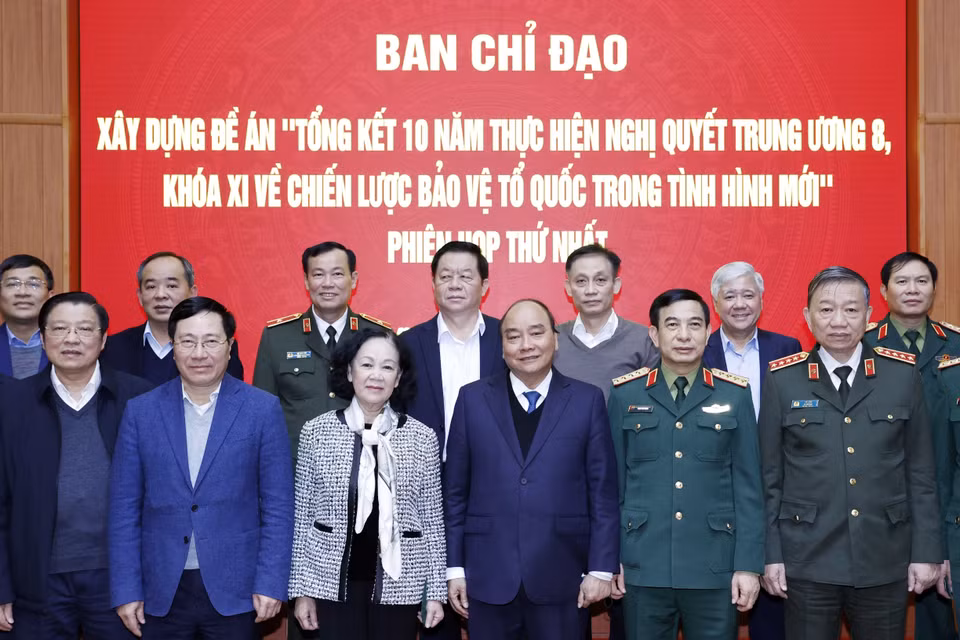 Chủ tịch nước Nguyễn Xuân Phúc và các thành viên Ban Chỉ đạo. (Ảnh: Thống Nhất/TTXVN)