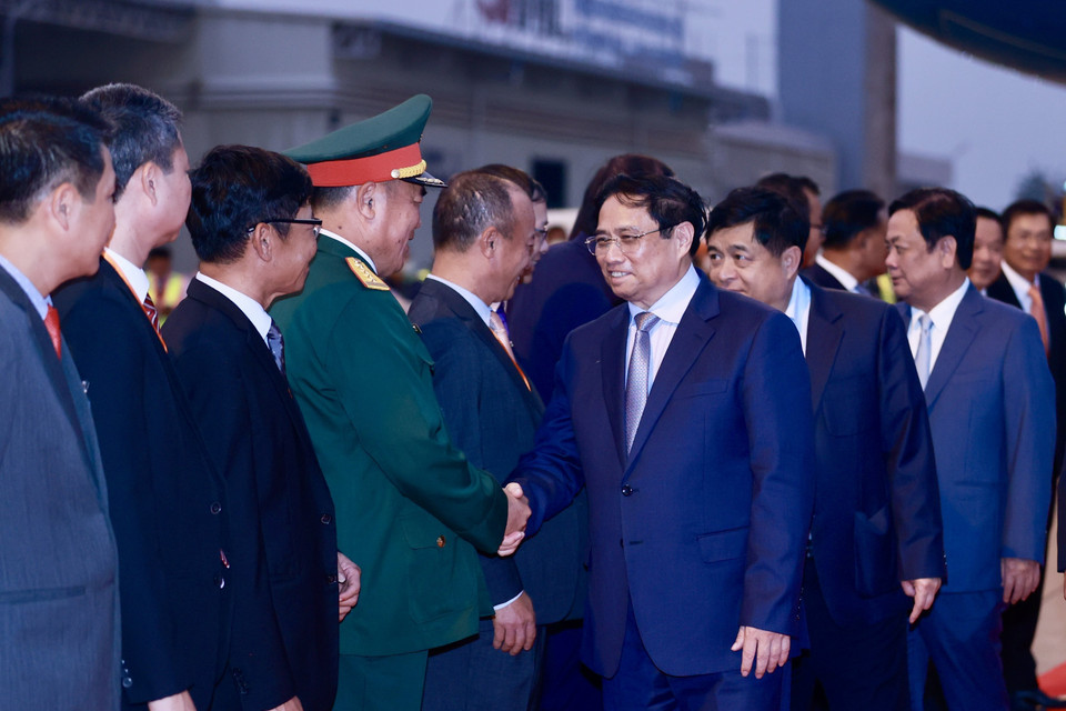 Lễ đón Thủ tướng Phạm Minh Chính tại Vientiane, Lào. (Ảnh: Dương Giang/TTXVN)