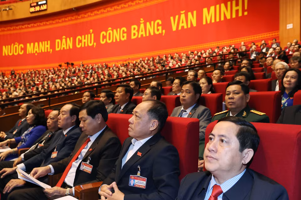 Các đại biểu dự phiên tham luận tại hội trường Trung tâm Hội nghị Quốc gia, sáng 27/1. (Nguồn: TTXVN)