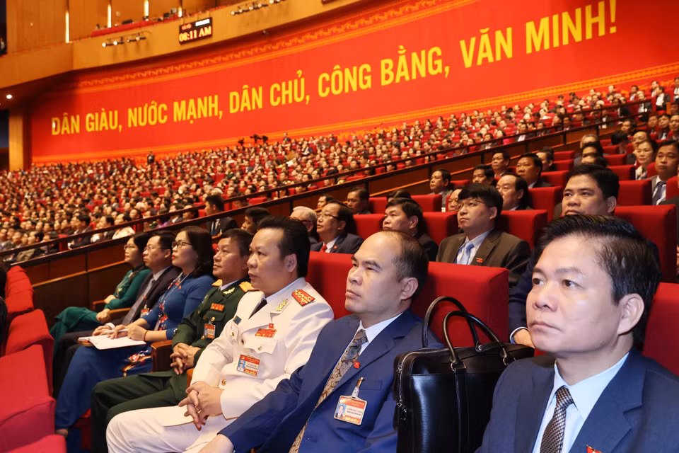 Các đại biểu dự phiên tham luận tại hội trường Trung tâm Hội nghị Quốc gia, sáng 27/1. (Nguồn: TTXVN)