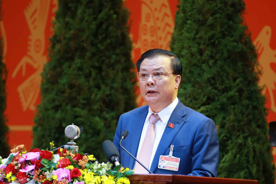 Đồng chí Đinh Tiến Dũng, Ủy viên Trung ương Đảng, Bộ trưởng Bộ Tài chính tham luận tại Đại hội. (Nguồn: TTXVN)