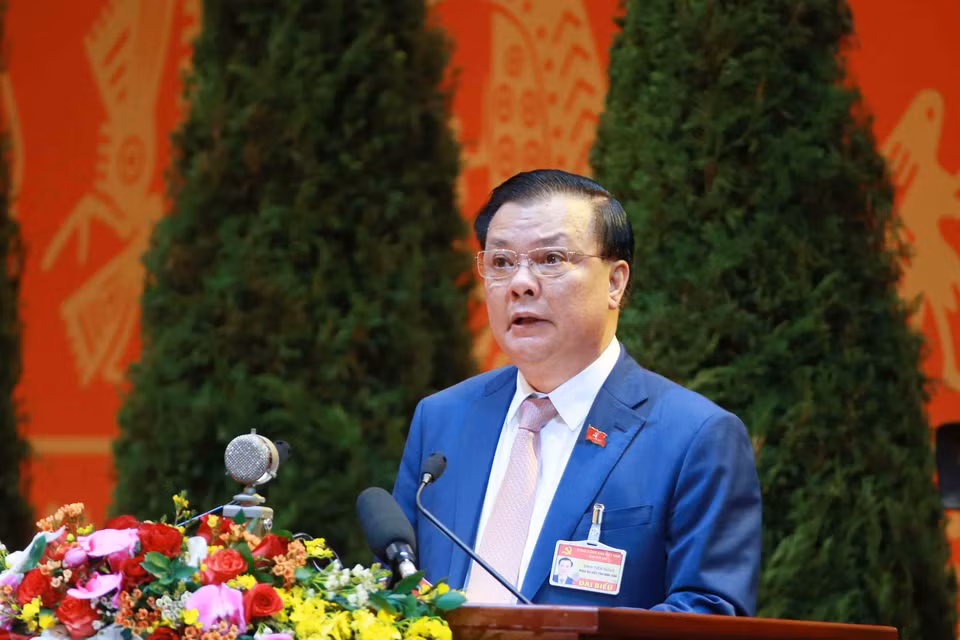 Đồng chí Đinh Tiến Dũng, Ủy viên Trung ương Đảng, Bộ trưởng Bộ Tài chính tham luận tại Đại hội. (Nguồn: TTXVN)