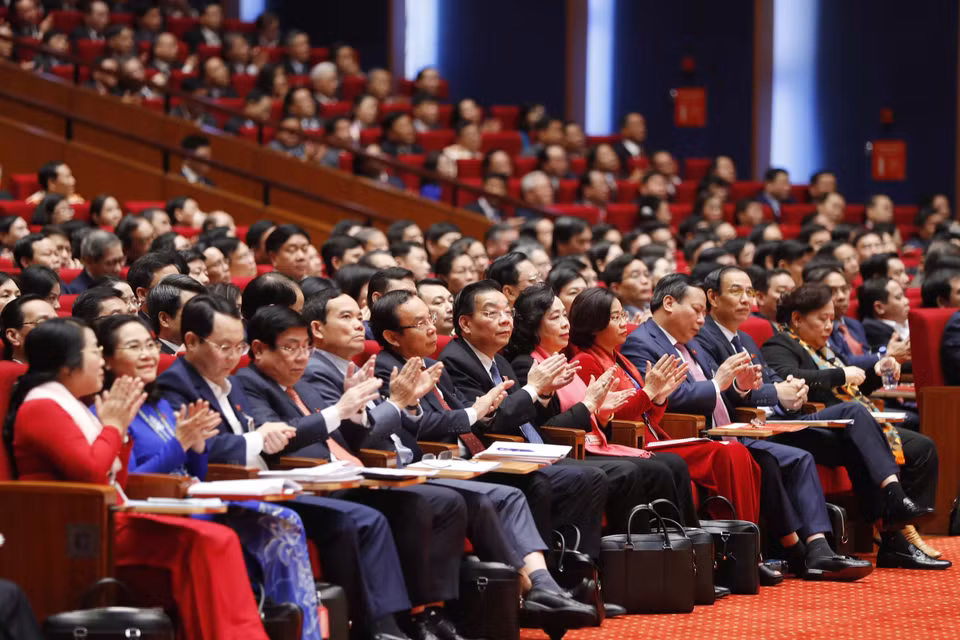 Các đại biểu dự phiên tham luận tại hội trường Trung tâm Hội nghị Quốc gia, sáng 27/1. (Nguồn: TTXVN)