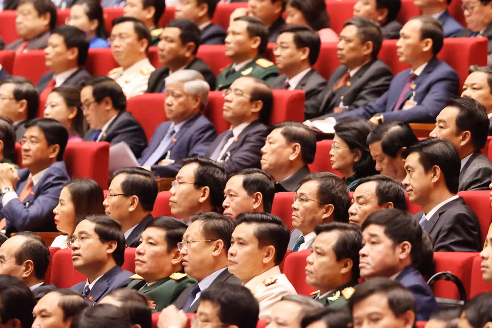 Các đại biểu dự phiên tham luận tại hội trường Trung tâm Hội nghị Quốc gia, sáng 27/1. (Nguồn: TTXVN)