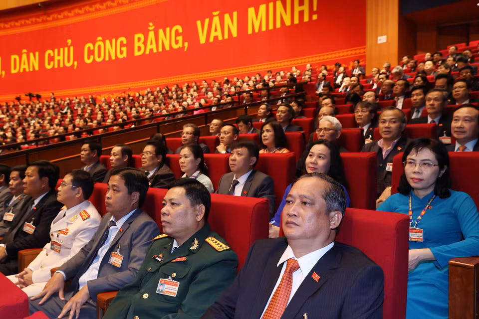 Các đại biểu dự phiên tham luận tại hội trường Trung tâm Hội nghị Quốc gia, sáng 27/1. (Nguồn: TTXVN)