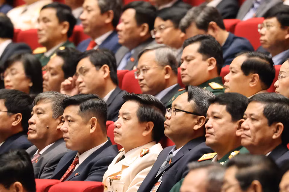 Các đại biểu dự phiên tham luận tại hội trường Trung tâm Hội nghị Quốc gia, sáng 27/1. (Nguồn: TTXVN)