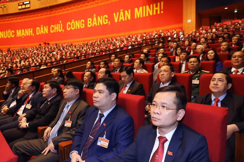 Các đại biểu dự phiên tham luận tại hội trường Trung tâm Hội nghị Quốc gia, sáng 27/1. (Nguồn: TTXVN)