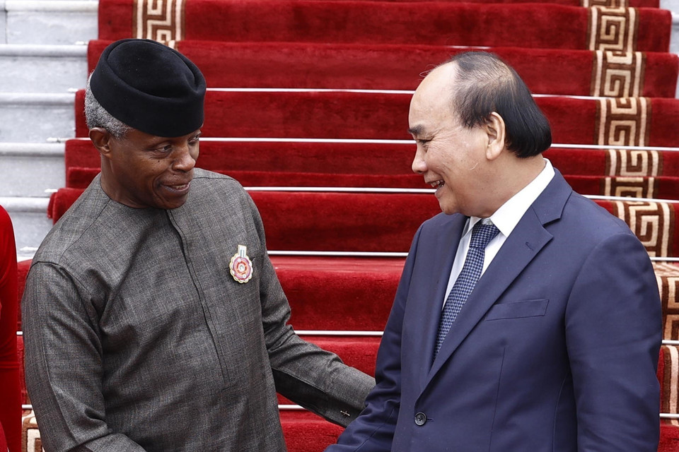 Chủ tịch nước Nguyễn Xuân Phúc tiếp Phó Tổng thống Cộng hòa Liên bang Nigeria Yemi Osinbajo. (Ảnh: Thống Nhất/TTXVN)