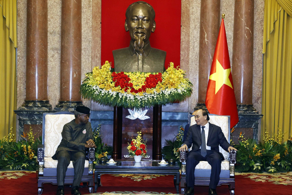 Chủ tịch nước Nguyễn Xuân Phúc tiếp Phó Tổng thống Cộng hòa Liên bang Nigeria Yemi Osinbajo. (Ảnh: Thống Nhất/TTXVN)