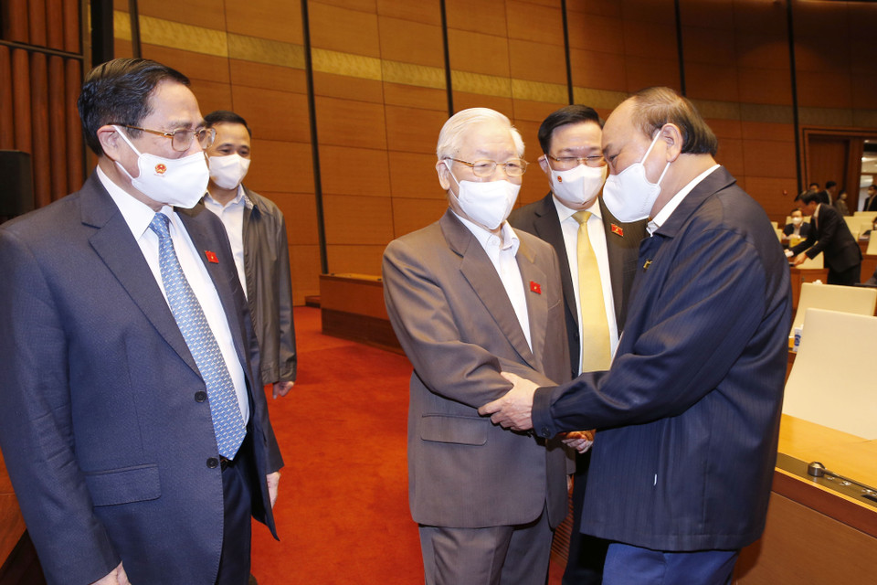 Tổng Bí thư Nguyễn Phú Trọng, Chủ tịch nước Nguyễn Xuân Phúc, Thủ tướng Phạm Minh Chính, Chủ tịch Quốc hội Vương Đình Huệ đến dự phiên họp. (Ảnh: Doãn Tấn/TTXVN)