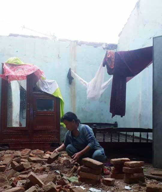 Nhà Trần Thị Báu, thị xã An Nhơn đã bị sập hoàn toàn. (Ảnh: Tường Quân/TTXVN)