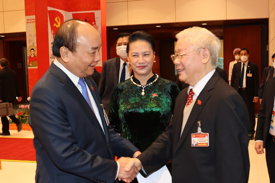 Tổng Bí thư, Chủ tịch nước Nguyễn Phú Trọng cùng Thủ tướng Nguyễn Xuân Phúc, Chủ tịch Quốc hội Nguyễn Thị Kim Ngân dự phiên thảo luận các văn kiện đại hội, sáng 28/1. (Nguồn: TTXVN)