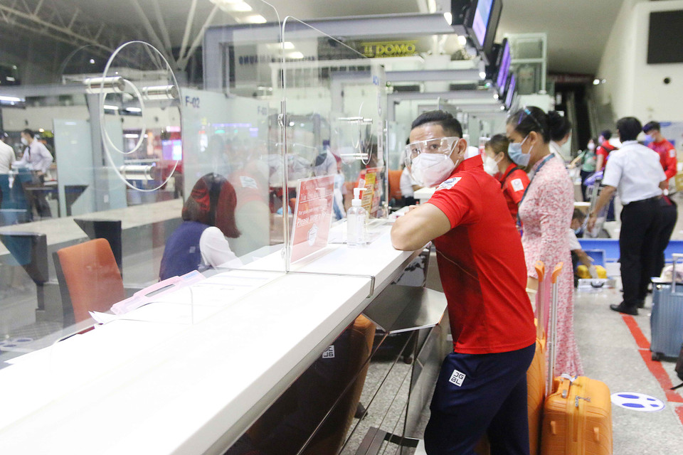 Thành viên đoàn thể thao các nước sẽ được ban tổ chức kiểm soát toàn bộ quy trình di chuyển, sinh hoạt khép kín từ khi đặt chân đến sân bay, về khách sạn, đến các địa điểm thi đấu và trở về. (Ảnh: PV/Vietnam+) 