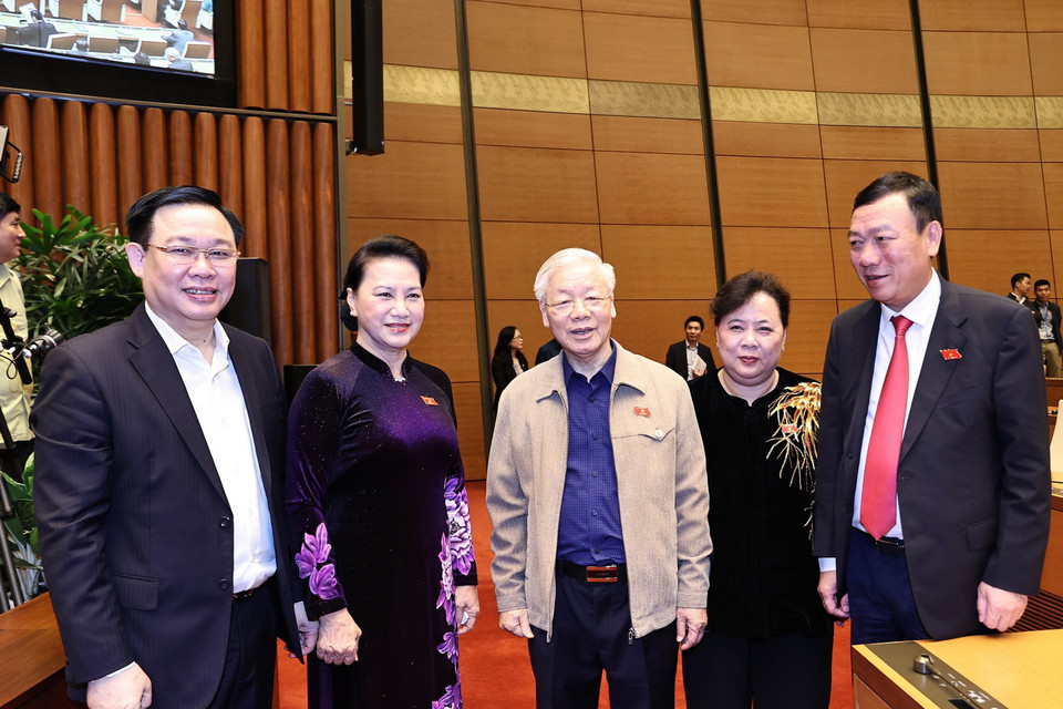 Tổng Bí thư, Chủ tịch nước Nguyễn Phú Trọng, Chủ tịch Quốc hội Nguyễn Thị Kim Ngân với các đại biểu Quốc hội. (Ảnh: Phương Hoa/TTXVN)