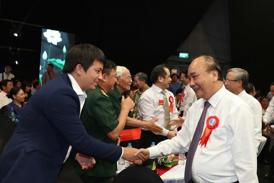 Thủ tướng Nguyễn Xuân Phúc và các lãnh đạo Đảng, Nhà nước tham dự Chương trình. (Ảnh: Thống Nhất/TTXVN)