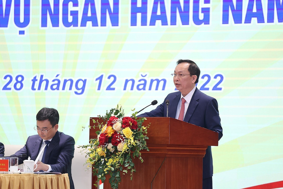Phó Thống đốc Ngân hàng Nhà nước Đào Minh Tú báo cáo kết quả hoạt động ngân hàng năm 2022, định hướng điều hành năm 2023. (Ảnh: Dương Giang/TTXVN)