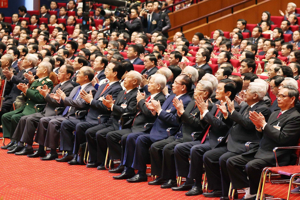 Các lãnh đạo, nguyên lãnh đạo Đảng, Nhà nước và đại biểu dự phiên khai mạc Đại hội. (Ảnh: TTXVN)