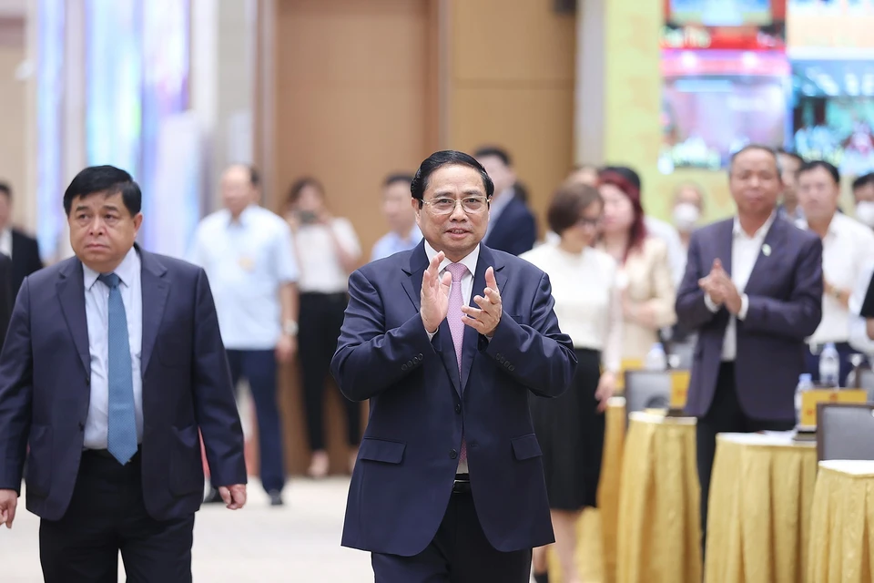 Thủ tướng Phạm Minh Chính đến dự Hội nghị công bố và triển khai Quy hoạch tổng thể quốc gia thời kỳ 2021-2030. (Ảnh: Dương Giang/TTXVN)