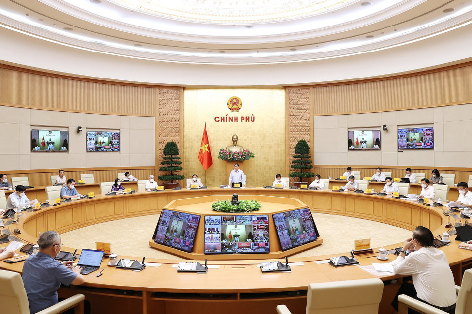 Thủ tướng Phạm Minh Chính chủ trì làm việc giữa BCĐ Quốc gia phòng, chống dịch COVID-19 với các địa phương. (Ảnh: Dương Giang/TTXVN)