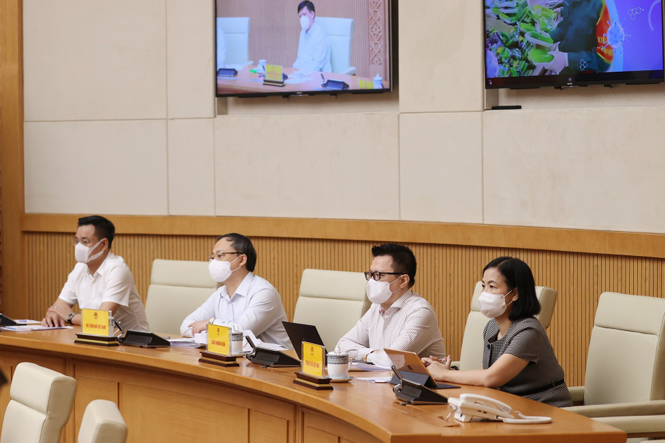 Đại diện lãnh đạo các cơ quan báo chí tham dự tại điểm cầu Chính phủ. (Ảnh: Dương Giang/TTXVN)