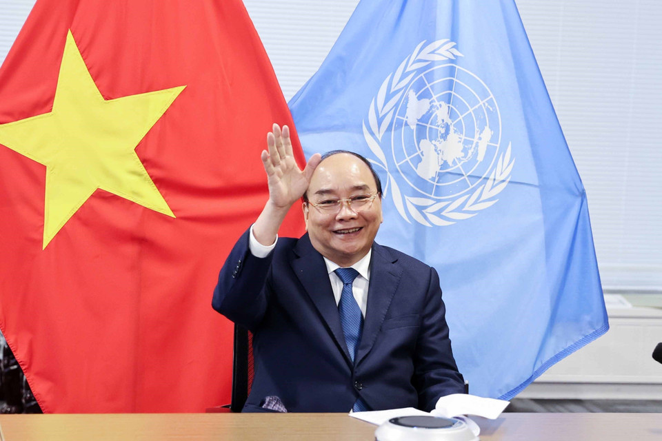 Chủ tịch nước Nguyễn Xuân Phúc gặp trực tuyến Tổng giám đốc IMF Kristalia Georgieva. (Ảnh: Thống Nhất/TTXVN)