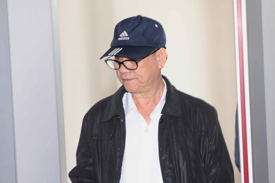 Bị cáo Trần Văn Minh (sinh năm 1955, cựu Chủ tịch UBND thành phố Đà Nẵng, giai đoạn từ năm 2006-2011) đến phiên xét xử. (Ảnh: Doãn Tấn/TTXVN)