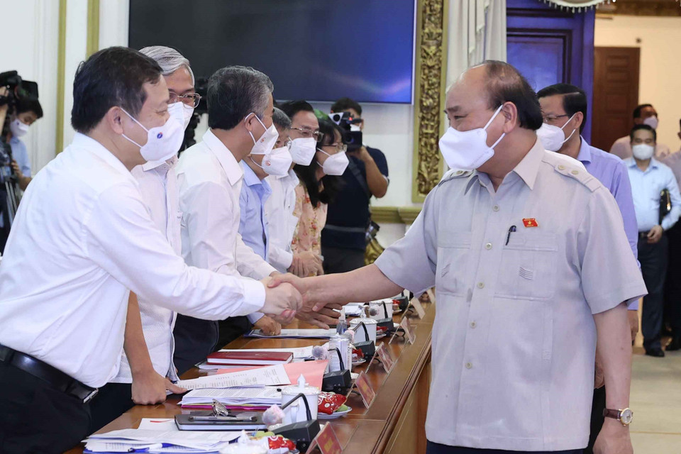 Chủ tịch nước Nguyễn Xuân Phúc với các đại biểu dự hội nghị. (Ảnh: Thống Nhất/TTXVN)