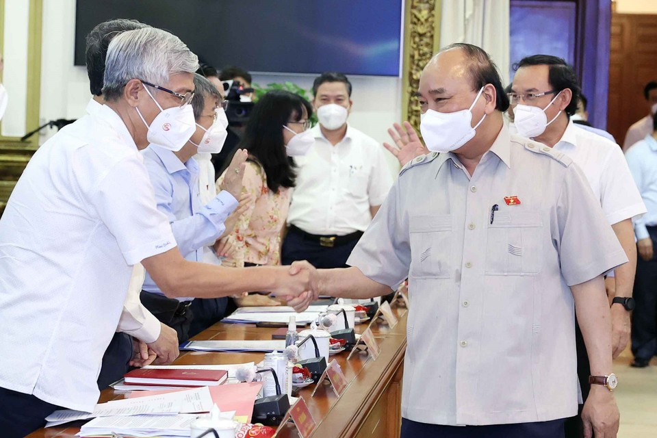 Chủ tịch nước Nguyễn Xuân Phúc với các đại biểu dự hội nghị. (Ảnh: Thống Nhất/TTXVN)