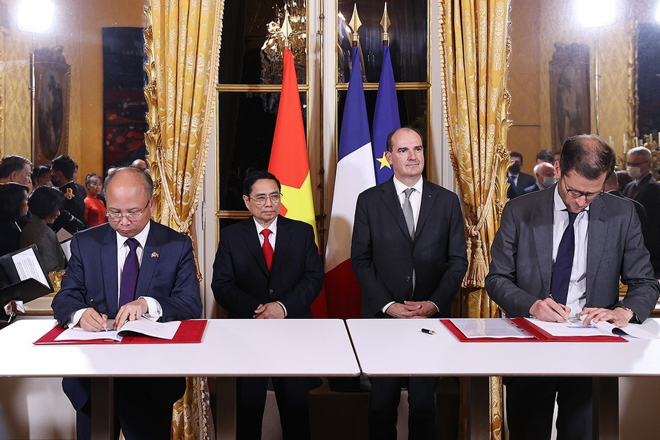 Lễ ký Thỏa thuận vay và Thỏa thuận viện trợ cho Dự án Quản lý đa thiên tai lưu vực sông Nậm Rốm nhằm bảo vệ dân sinh, thích ứng biến đổi khí hậu và phát triển kinh tế, xã hội tỉnh Điện Biên. (Ảnh: Dương Giang/TTXVN)