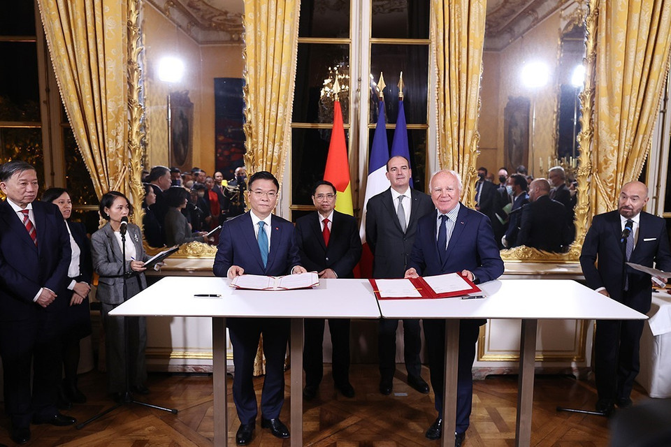 Lễ ký Thỏa thuận hợp tác giữa Bộ Tư pháp Việt Nam và Tham Chính viện Cộng hòa Pháp giai đoạn 2021-2026. (Ảnh: Dương Giang/TTXVN)