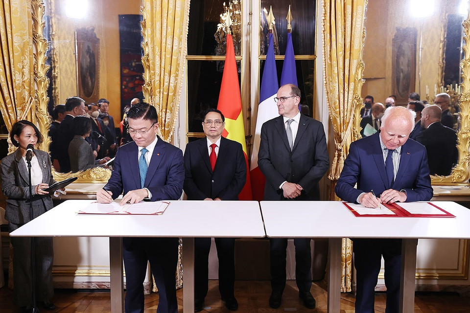 Lễ ký Thỏa thuận hợp tác giữa Bộ Tư pháp Việt Nam và Tham Chính viện Cộng hòa Pháp giai đoạn 2021-2026. (Ảnh: Dương Giang/TTXVN)