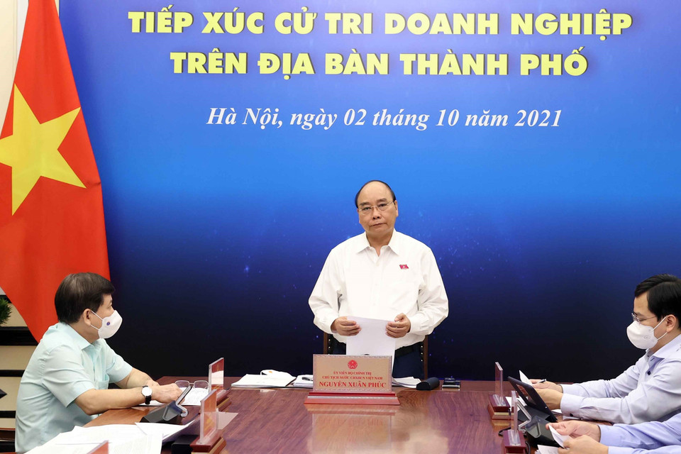 Chủ tịch nước Nguyễn Xuân Phúc phát biểu tại điểm cầu Hà Nội. (Ảnh: Thống Nhất/TTXVN)