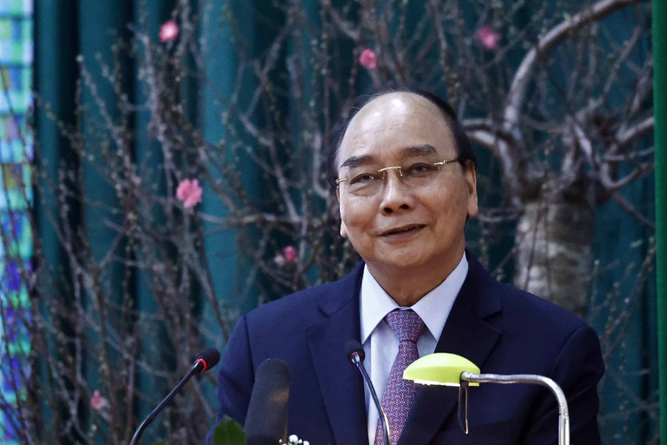 Chủ tịch nước Nguyễn Xuân Phúc chúc Tết cán bộ, chiến sỹ Bộ đội Biên phòng tỉnh Đắk Lắk. (Ảnh: Thống Nhất/TTXVN)