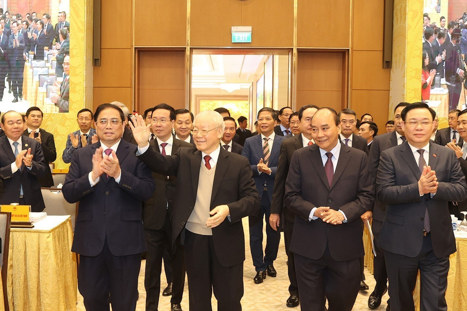 Tổng Bí thư Nguyễn Phú Trọng cùng các vị lãnh đạo Đảng, Nhà nước và đại biểu đến dự hội nghị. (Ảnh: Trí Dũng/TTXVN)